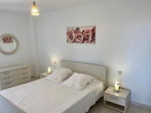 Postel nebo postele na pokoji v ubytování Ocean View Apartament