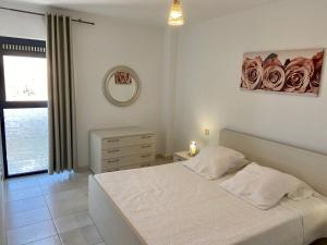 Postel nebo postele na pokoji v ubytování Ocean View Apartament