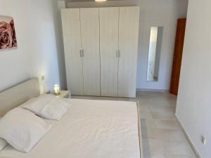 Postel nebo postele na pokoji v ubytování Ocean View Apartament