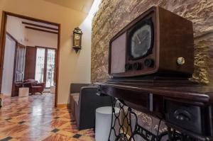 A television and/or entertainment centre at Youth Hostel Jávea