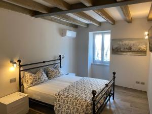 Giường trong phòng chung tại CASA MARTINELLI