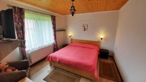 Postel nebo postele na pokoji v ubytování Casa de vacanta Two Brothers Concept