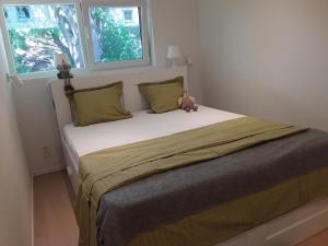 Giường trong phòng chung tại Terrasses de Malmedy - Duplex 419