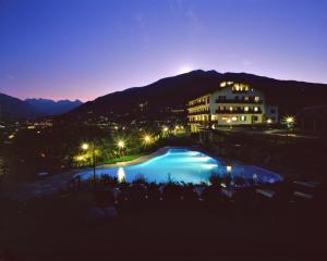 a large building with a view of the ocean at Hotel Milleluci in Aosta