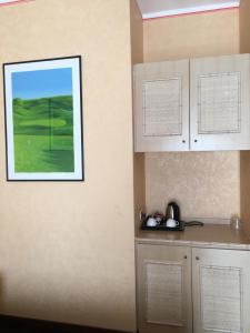 Kuchyň nebo kuchyňský kout v ubytování Serravalle Golf Hotel