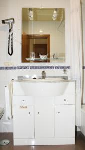 Koupelna v ubytování Hotel Bello