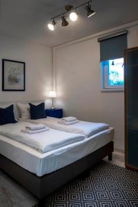 Postel nebo postele na pokoji v ubytování Vento Balaton