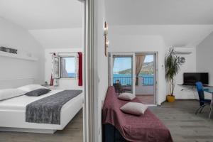 Postel nebo postele na pokoji v ubytování Apartman Toni