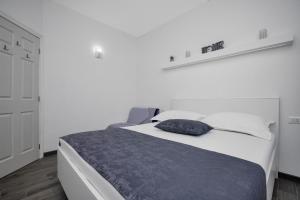Postel nebo postele na pokoji v ubytování Apartman Toni