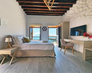 Postel nebo postele na pokoji v ubytování Aegean View Villas