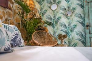 Cama o camas de una habitación en Hotel Posada de las Cuevas
