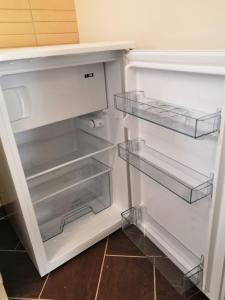 Kuchyňa alebo kuchynka v ubytovaní NewIsland Family Apartman