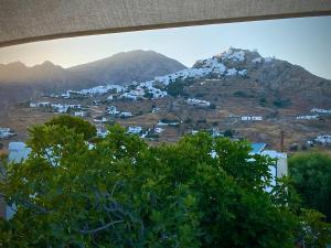 a view of a mountain with white houses on a hill at Asteri Hotel in Livadi