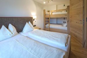 Krevet ili kreveti u jedinici u okviru objekta Hotel Gasthof Obermair