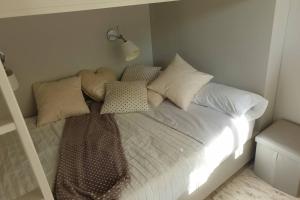 Posteľ alebo postele v izbe v ubytovaní APARTAMENTO 1ª LINEA DE MAR CAMBRILS VILAFORTUNY