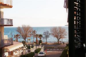 a view of the ocean from a balcony of a building at MD House - Amalfi Coast in Maiori