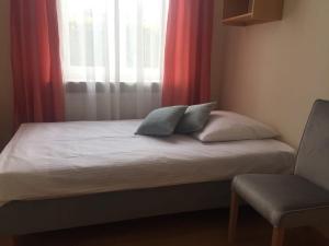 Postel nebo postele na pokoji v ubytování Pod Jabłonią