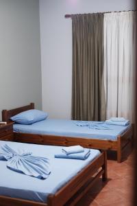 Postel nebo postele na pokoji v ubytování Hotel Nuanti