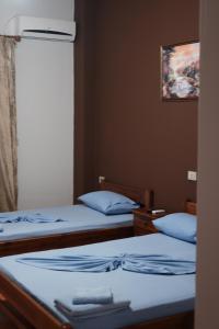 Postel nebo postele na pokoji v ubytování Hotel Nuanti