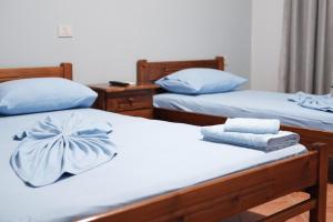 Postel nebo postele na pokoji v ubytování Hotel Nuanti