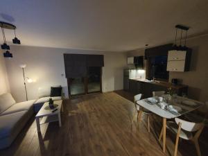 Kuchnia lub aneks kuchenny w obiekcie Apartamenty i Domki Mierzeja