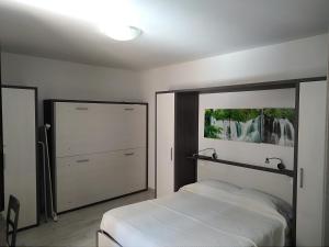 Postel nebo postele na pokoji v ubytování B&B L'Acero