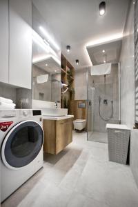 Kúpeľňa v ubytovaní P&O Serviced Apartments Group Komputerowa