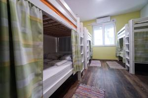 Postel nebo postele na pokoji v ubytování Oasis hostel
