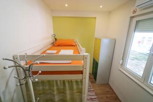 Postel nebo postele na pokoji v ubytování Oasis hostel