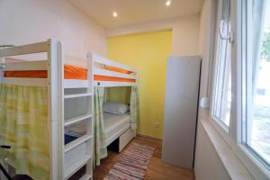 Postel nebo postele na pokoji v ubytování Oasis hostel