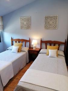 Postel nebo postele na pokoji v ubytování Apartamentos Marsó