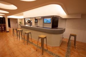 TV a/nebo společenská místnost v ubytování Hotel Valentin