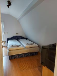 Postel nebo postele na pokoji v ubytování Perucac Apartment