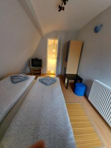 Postel nebo postele na pokoji v ubytování Perucac Apartment