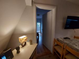 TV a/nebo společenská místnost v ubytování Perucac Apartment