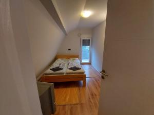 Postel nebo postele na pokoji v ubytování Perucac Apartment