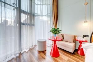 Voodi või voodid majutusasutuse Happy Dragon City Culture Hotel-Tianjin Draum Tower & Dayuecheng shopping mall toas