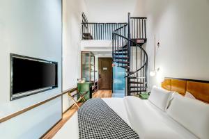 Voodi või voodid majutusasutuse Happy Dragon City Culture Hotel-Tianjin Draum Tower & Dayuecheng shopping mall toas