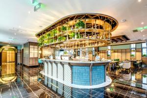 Sohvabaar või baar majutusasutuses Happy Dragon City Culture Hotel-Tianjin Draum Tower & Dayuecheng shopping mall