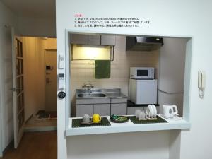 A kitchen or kitchenette at NEBULA K