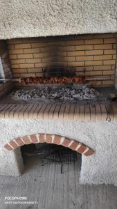 Gril dostupný pro hosty v apartmánu