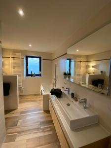 Ένα μπάνιο στο Ferienwohnung Hopfengarten