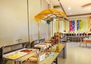 Posezení v ubytování HARRIS Hotel Sentul City Bogor