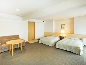 Un pat sau paturi într-o cameră la Diamond Kyoto Society +84 fotografii