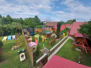 an aerial view of a park with a playground at Drevenica Talia in Liptovský Mikuláš