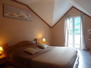 Letto o letti in una camera di Chambres d'hôtes DORIS