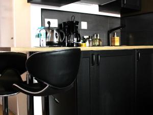 Kuchyň nebo kuchyňský kout v ubytování Appart Hotel Relax Spa