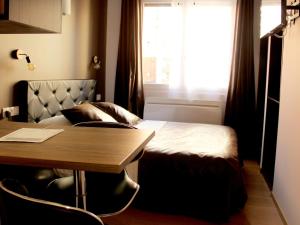 Postel nebo postele na pokoji v ubytování Appart Hotel Relax Spa