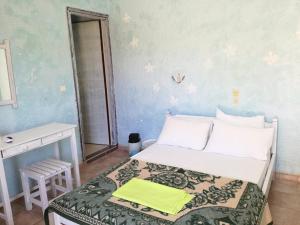 Postel nebo postele na pokoji v ubytování Madalenas B&B