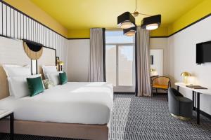 Postel nebo postele na pokoji v ubytování Best Western Premier Hotel Roosevelt